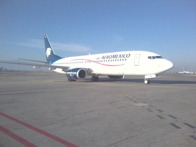 Boeing 737-700 (XA-AMK) - ENTRANDO A POS 10 DE LA TERMINAL 1 DE GDL.