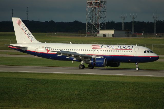 Airbus A319 (N260AV) - this 319 had just landed on 36R and was full reverse thusters with spoilers early morning shot       just before the MD-11 from Germany