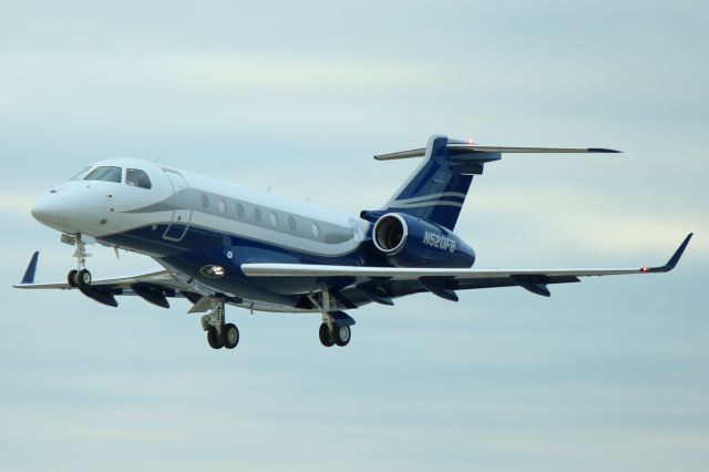 Embraer Legacy 550 (N520FB) - An Embraer Legacy 550 just about to touchdown on RWY 6L on 18 Dec 2018.