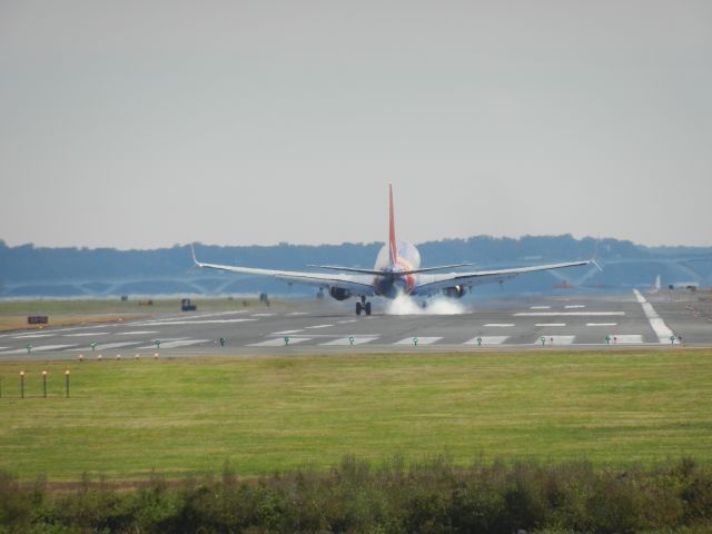 Boeing 737-700 — - A Southwest B737-700 Burnin' Rubber As It Touches Down At Reagan National