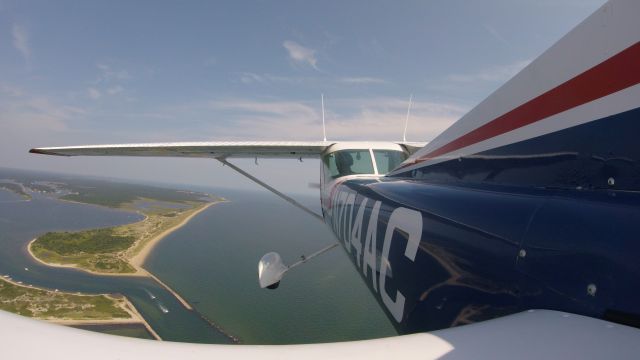 Cessna Commuter (N704AC) - Beach buzzing. South Cape Beach, MA