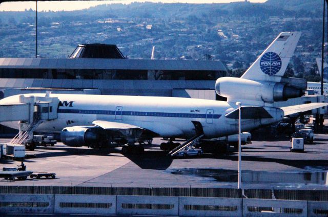 McDonnell Douglas DC-10 (N67NA) - KSFO - Pan Am DC-10 at the Dock - originally delivered to National Airlines Nov 1972, went to Pan Am 1980 and then went to American Airlines as N154AA 1983 - I caught this on color slide film probably early 1980sbr /br /Serial number 46709 LN:68br /Type DC10-10br /First flight date 14/10/1972