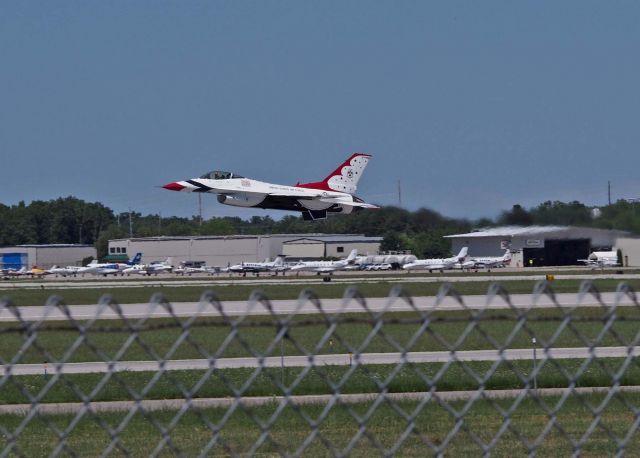 Lockheed F-16 Fighting Falcon — - Cherry Festival time in Traverse City, Michigan.br /I was standing off either the east or west ends of the main runway.  Commercial traffic departed to the east, military airshow traffic departed to the west.