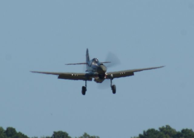 CURTISS Warhawk (N1941P) - P-40 Warhawk on final. An amazing Warbirds over the Beach 2021 airshow at Jerry Yagen’s Military Aviation Museum at Pungo, VA near Virginia Beach, 2-3 October 2021. If you’ve never attended one of his airshows, you ought to check it out. Multiple formations of US Army Air Corps, US Navy, RAF, and German aircraft. With Covid, this show was a combined WWI, WWII, etc. airshow. 