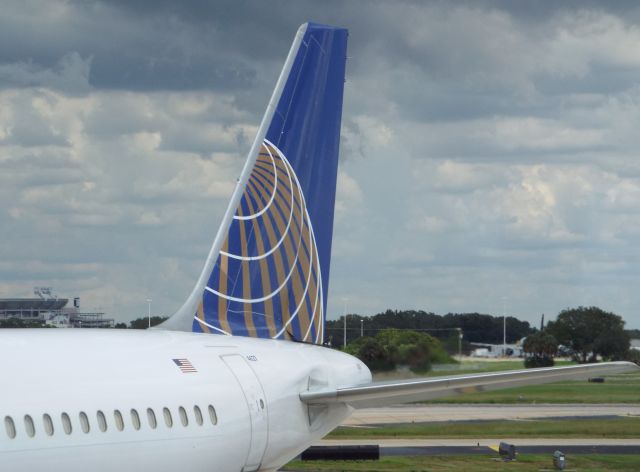 Airbus A319 — - This United bus is parked at the gate prior to boarding at Airside A.