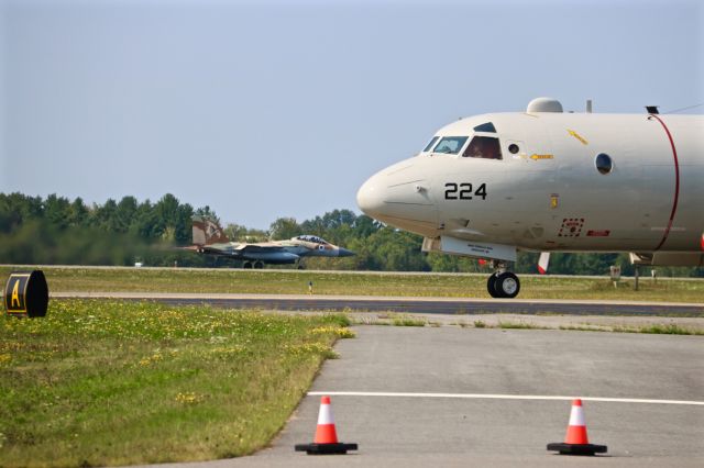 Lockheed P-3 Orion (USN224) - Israeli Air Force F-15 launches as US Navy P-3 taxis by.