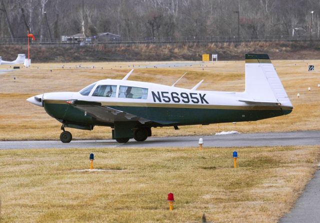 Mooney M-20 (N5695K) - A private Mooney M20J turning off of College Park Airport's runway 15 