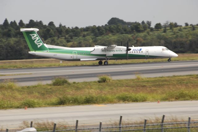 de Havilland Dash 8-200 (JA857A) - Departure at NRT Airport Runway 16L on 2011/10/9 Green Eco c/s