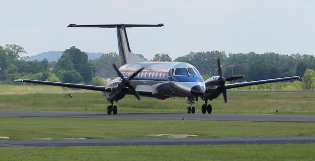 Embraer EMB-120 Brasilia (N561SW) - A Berry Aviation Embraer EMB-120 Brasilia moving up the taxiway toward the ramp at Boswell Field, Talladega Municipal Airport, AL - June 6, 2017. 