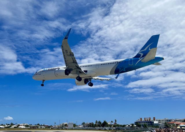 Airbus A321neo (C-GOIE) - C-GOIE, a Airbus A321-271NX, coming into SXM over Maho Beach. 3/21/22. 