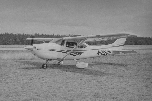 Cessna Skylane (N182GH) - Iosco County annual Fly In on Sunday July 14th 2024 taken with an Olympus OM-1 with Ilford Hp5+ black and white film