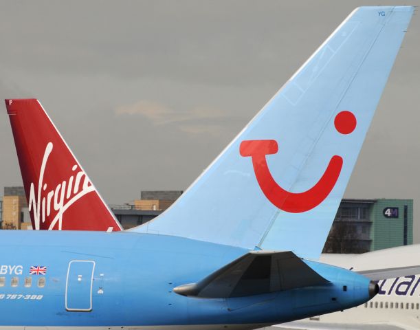 BOEING 767-300 (G-OBYD) - Thompson B76.3 G-OBYD lines up for the runway in front of B74.4 G-VLIP of Virgin