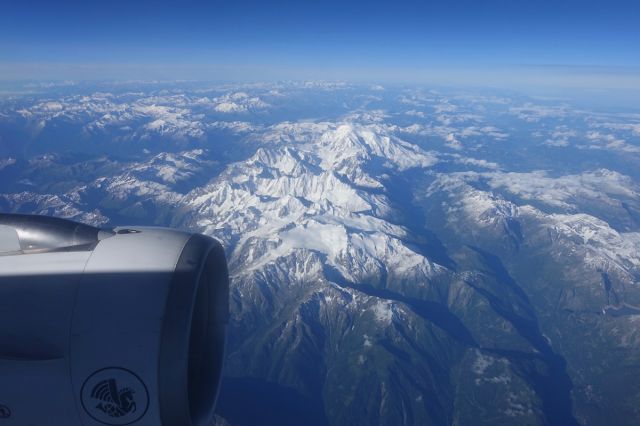 Airbus A318 — - Alps part 2. Part of an SFO-BOS-LIS-MXP-CDG-IAH-SFO hop.