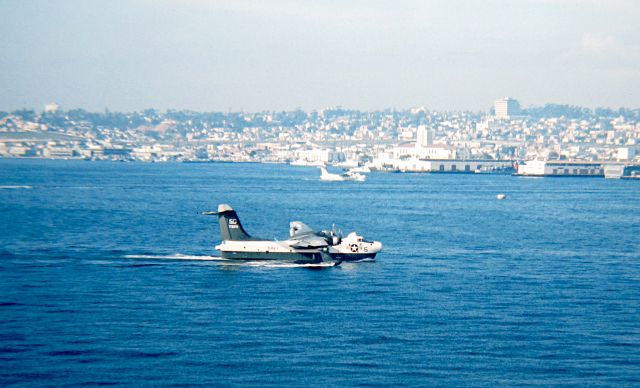 — — - An SP-5B of the VP-50 "Blue Dragons" based at NAS North Island taxis in San Diego Bay.  Taken from the fantail of the USS Kitty Hawk 1967.  I remember they would start the takeoff run from midway between North Island and San Diego and be almost out of sight by Point Loma before they slowly lifted off.