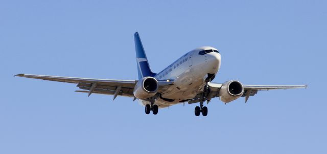 BOEING 737-600 (C-GWSK) - Westjet Boeing 737-600 on final at CYXE.