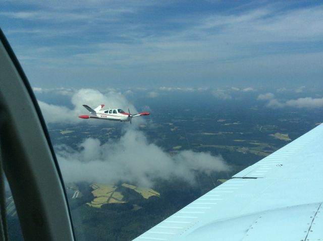 Beechcraft 35 Bonanza (N2021E) - Formation practice over Carolina. 