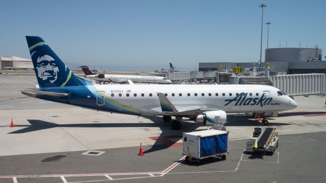 EMBRAER 175 (long wing) (N174SY) - Parked at the gate at San Francisco.