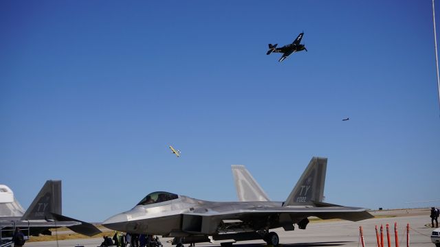 Lockheed F-22 Raptor — - T6 TEXAN AND OTHER FLYING OVER A F22