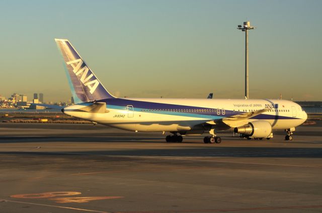 BOEING 767-300 (JA8342) - At sunrise, Tokyo just behind...