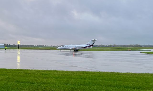 BEECH Beechjet (400XT/400XPR) (N727KB) - N727KB, a Nextant 400XT, pulling into the FBO, on a rainy evening, after arriving from Tyler, TX. (KTYR). 10/29/21. 