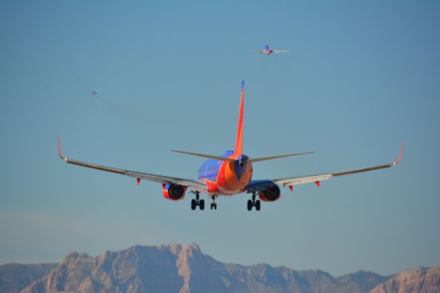 Boeing 737-800 — - Southwest Airlines 737-800 landing 25L McCarran (KLAS) while two depart via 25R