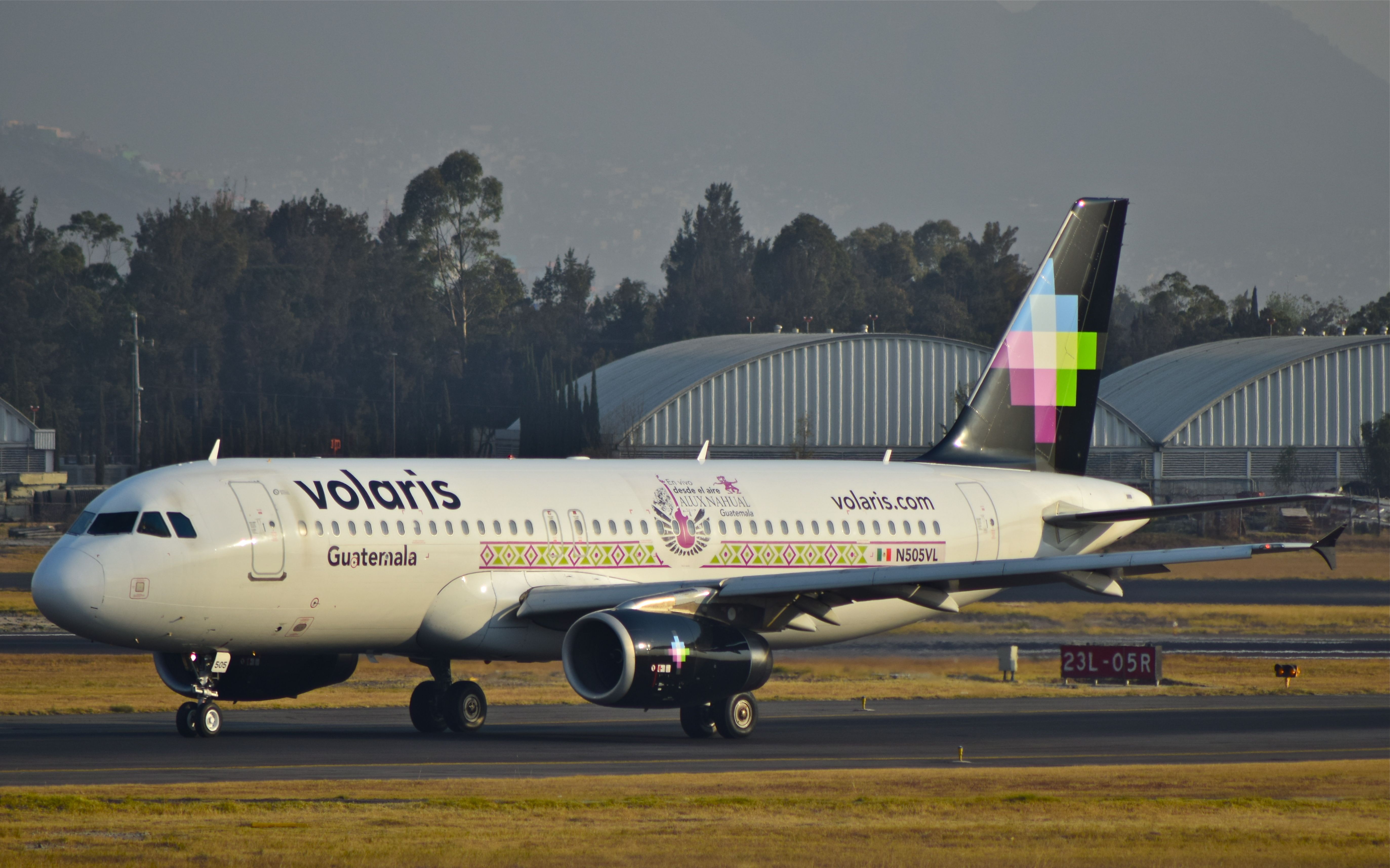 Airbus A320 (N505VL) - Volaris A320-233, airframe 4798 with Guatemala - Alux Nahual livery, landing on 05R runway at Mexico City Airport.