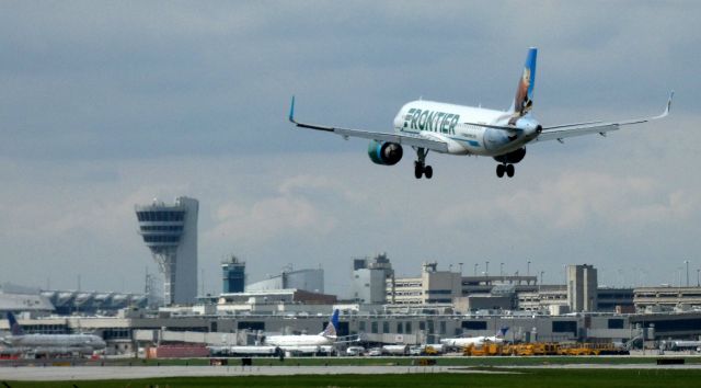 Airbus A320neo (N328FR) - On final is this 2018 Frontier Airbus A320-251N with "Scout" the Marten riding the tail in the Autumn of 2020.