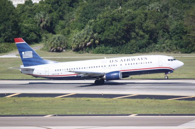 BOEING 737-400 (N455UW) - US Air Flight 1179 (N455UW) departs Runway 1L at Tampa International Airport enroute to Charlotte-Douglas International Airport