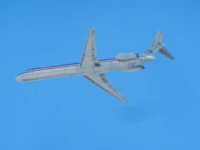 McDonnell Douglas MD-83 (N9629H) - An American Airlines DC-9-93 (MD-83) Flies By My House Approaching Dulles International, Her Beautiful Bare Metal Of The Silver Bird Starts Turning Whiter Then Normal Because Of All Of The Snow On The Ground, Combined With The Position The Aircraft Was In While The Lighting Of The Clear Afternoon Sky Shined Down, Very Beautiful!