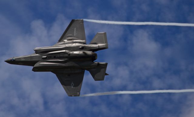 16-8727 — - US Marine F-35B pulling streamers in a tight turn in front of show center at the 2016 Farnborough airshow 