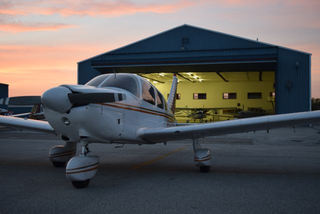 Piper Cherokee (N3553M) - Used to work at a dealership, and we used this picture on the website up until recently. Photo taken by me while putting the aircraft back inside for the night. Shot with Nikon D5000