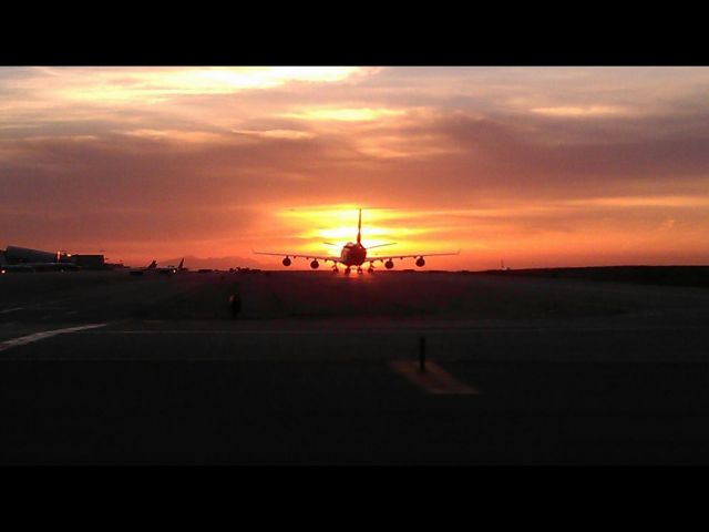 — — - Sunrise at LAX