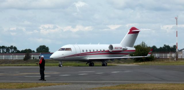 Canadair Challenger (N327TW) - Taxiing to parking is this 1999 Bombardier Challenger 604 from the Summer of 2023.