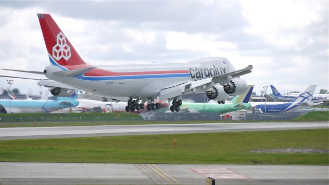 BOEING 747-8 (LX-VCE) - BOE505 (LN:1454) nears touchdown on runway 16R to complete a test flight to KMWH on 5/5/12. This aircraft is named City of Echternach.