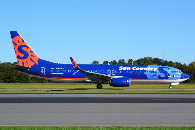 Boeing 737-800 (N821SY) - Taxiing for departure at KJQF after dropping off Ace & TJ Grin Kids and their families returning from Disney World - 10/21/18