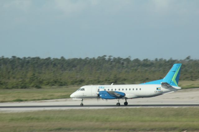 Saab 340 (C6-SBD) - 091513 Sky Bahamas on take-off roll Rwy 14