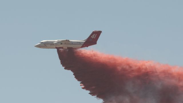 British Aerospace BAe-146-200 (N471NA) - Neptune Aviation tanker 41 makes a retardant drop on the "Shooting" Fire in Carson City.