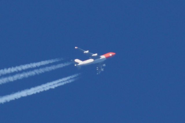 Boeing 747-400 (OO-THB) - TNT B747-400 flying over Boston Logan after departing JFK for Liege. 