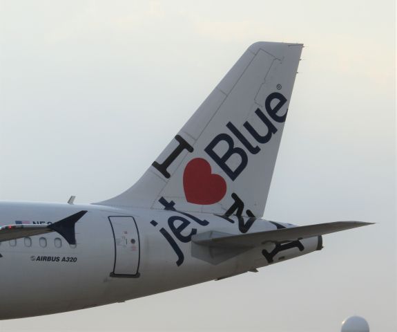Airbus A320 (N586JB) - *****SELECT FULL FOR HD*****br /br /br /br /br /br /br /"I love NY" livery on taxiway C in Buffalo NY! TAIL VIEW