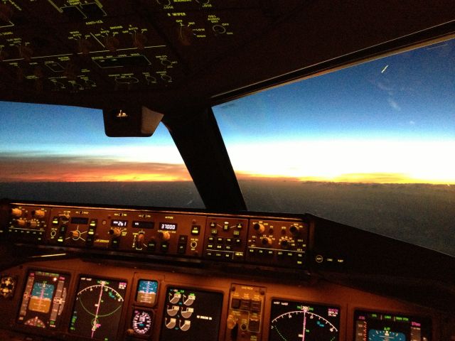 Boeing 777-200 — - Pacific sunset