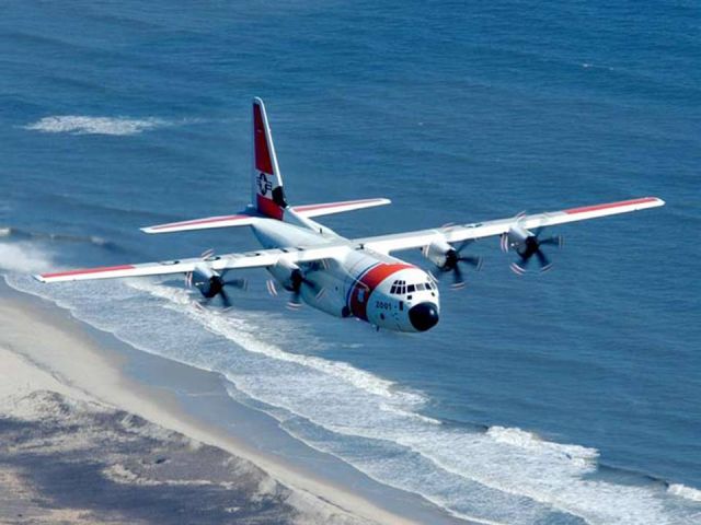 Lockheed C-130 Hercules — - Buzzing the beach