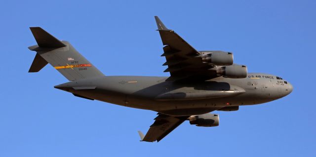 05-5140 — - As the sun is setting behind my spotting position, this March-based C17A Globemaster (05-5140) climbs away from Reno Tahoe Internationals runway 16R and up into a cool blue late afternoon/early evening sky. br /Rather surprisingly, according to the data counter, this is apparently the first picture of 05-5140 to be posted into FAs photo gallery.  I find that a bit difficult to believe; however, thats what is indicated below.  br /* I suggest clicking on the FULL size of this pic to see it in best Q and C. * 