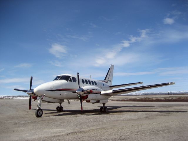 Beechcraft King Air 100 (C-FUPQ) - C-FUPQ, Exact Airs King Air 100 on the ground in Némiscau, Québec, operating the weekly ET113 & ET114 flight from and to CYBG (Bagotville) - April 2011