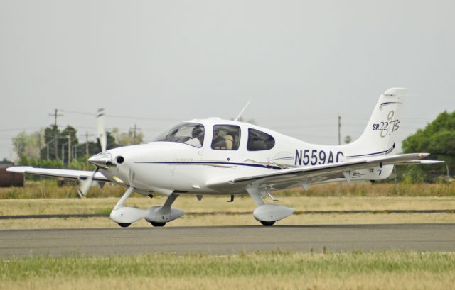 Cirrus SR-22 (N559AC) - SR-22 departs runway three-zero ant Merced Regional Airport