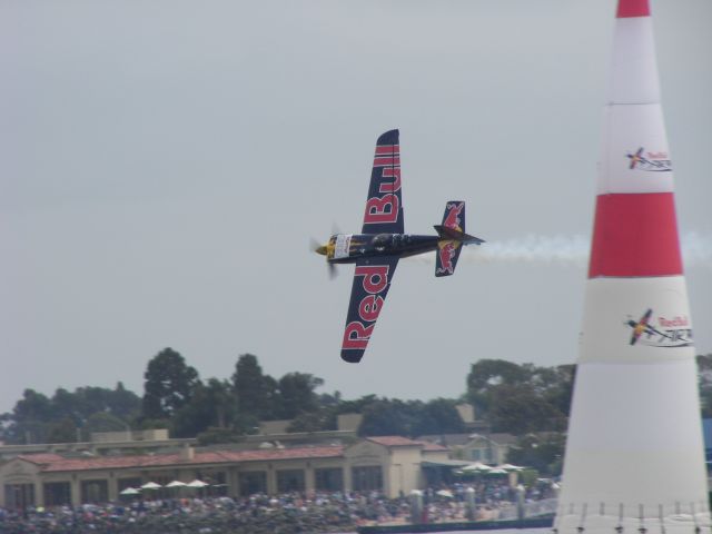 ZIVKO Edge 540 (N423KC) - Red Bull Air Race 2008  San Diego, CA  Kirby Chambliss thru the chicane!