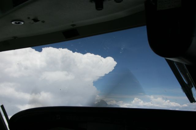 Piper Cheyenne (N23334) - FL 250.  Thunderstorm