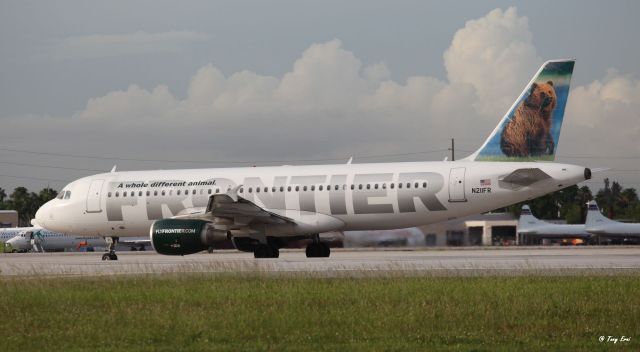 Airbus A320 (N211FR) - "Grizwald the Grizzly Bear" moving to the runway for a departure to Denver on the 13th of June, 2018. Click on full.