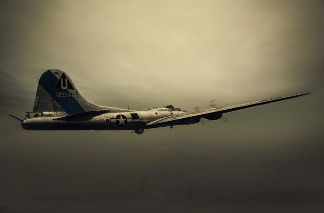 Boeing B-17 Flying Fortress (N9323Z) - Airplane was on the ramp, I just photoshopped it flying