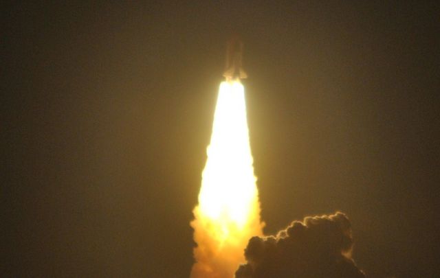 — — - Space Shuttle Endeavour on last Shuttle Night Launch, STS-130 from Pad 39A at Kennedy Space Center Feb 2010...