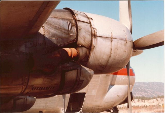 N422AU — - Erickson Boeing Straocruiser Guppy at Penticton BC Canada CYYF - Brought Skycrane S64 helicopter to remove another helicopter from a mountain. 1990